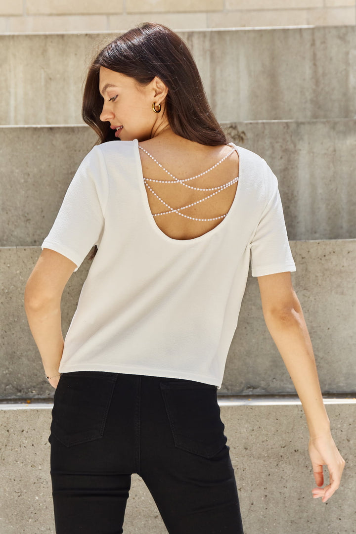 And The Why Pearly White Full Size Criss Cross Pearl Detail Open Back T-Shirt-Ever Joy